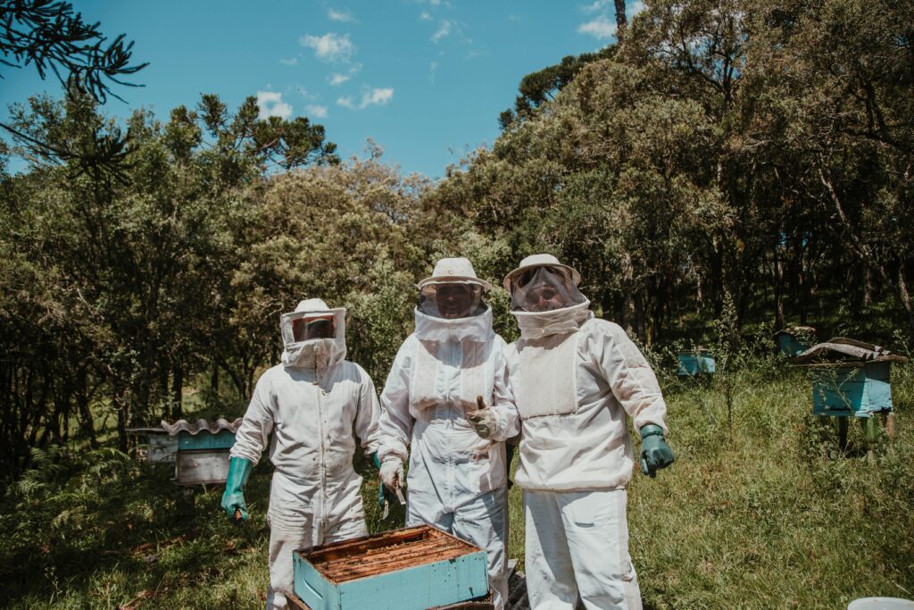 Three People in White Suit